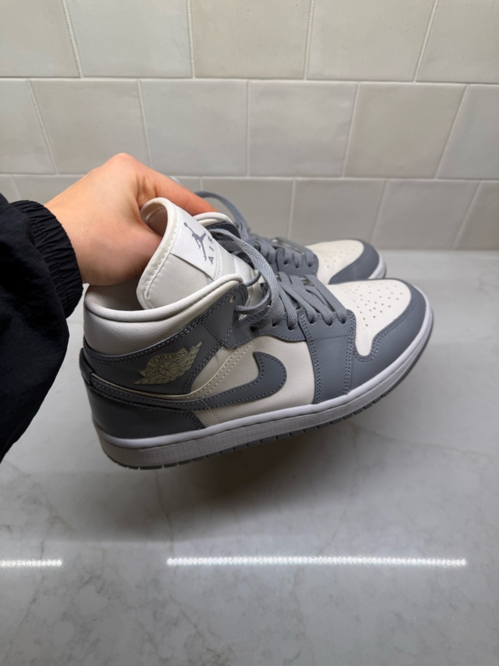 Air Jordan High Top Sneaker in White and Gray